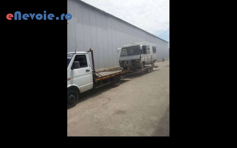 servicii-mutari-transport-marfuri-transport-depozitare--helmeseanu-panait-9484.png